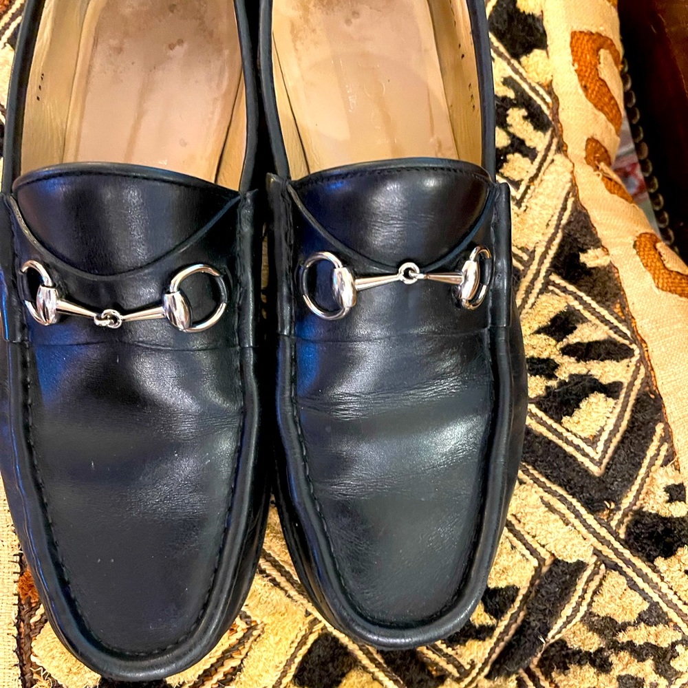 Gucci Men’s Horsebit black leather loafers.
